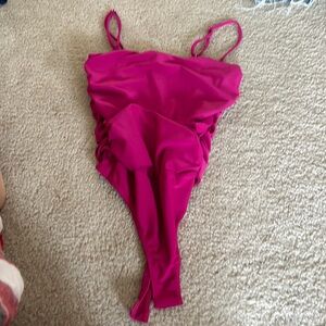 Hot pink body suit